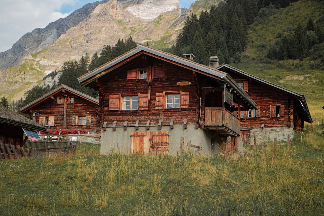 Traditional Swiss alpine chalet exterior with wooden facade in the mountains